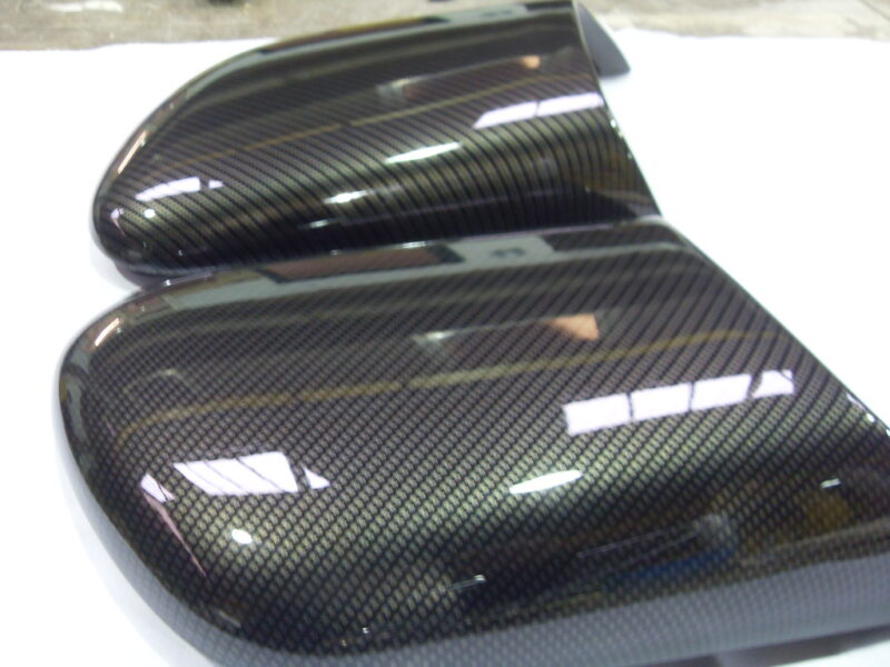 Motorbike various elements coated in carbon fibre hydrographic film painted black