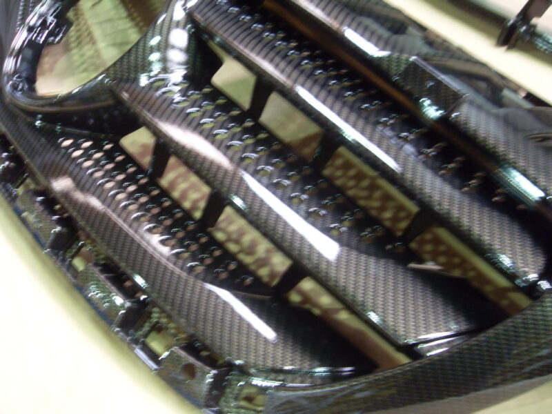 Mercedes radiator cover coated in carbon fibre hydrographic film painted black