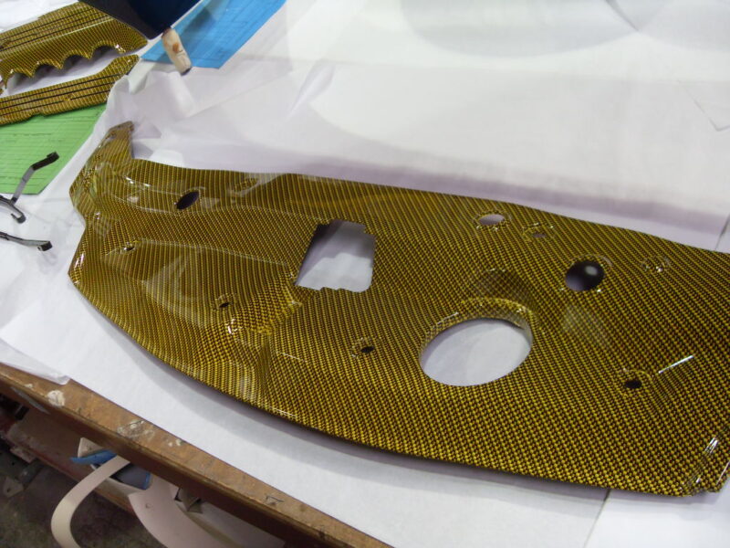 Honda engine elements coated in carbon fibre hydrographic film painted yellow