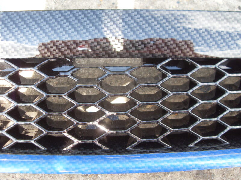 Ford Focus ST radiator grill coated in carbon fibre hydrographic film painted black