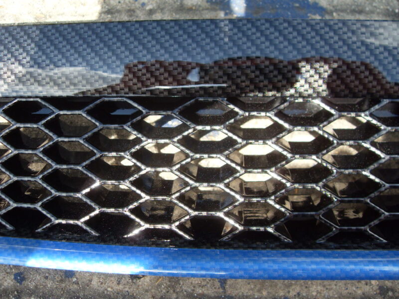 Ford Focus ST radiator grill coated in carbon fibre hydrographic film painted black