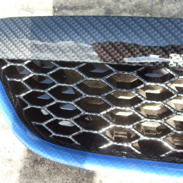 Ford Focus ST radiator grill coated in carbon fibre hydrographic film painted black