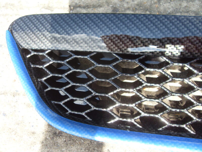 Ford Focus ST radiator grill coated in carbon fibre hydrographic film painted black