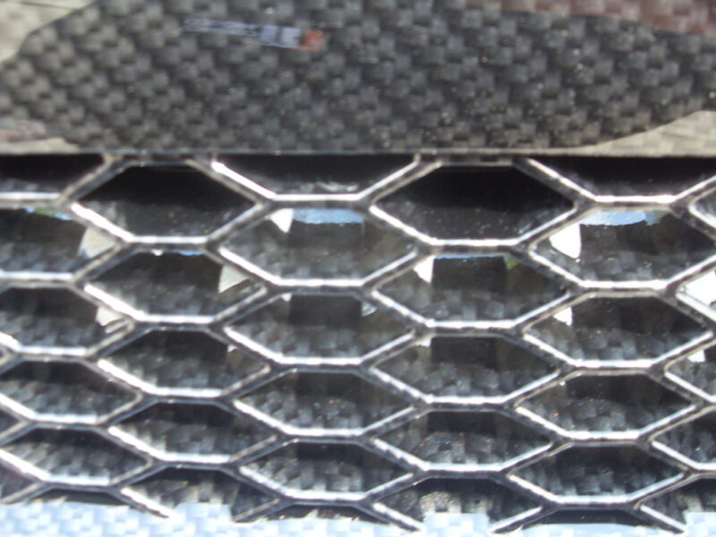 Ford Focus ST radiator grill coated in carbon fibre hydrographic film painted black