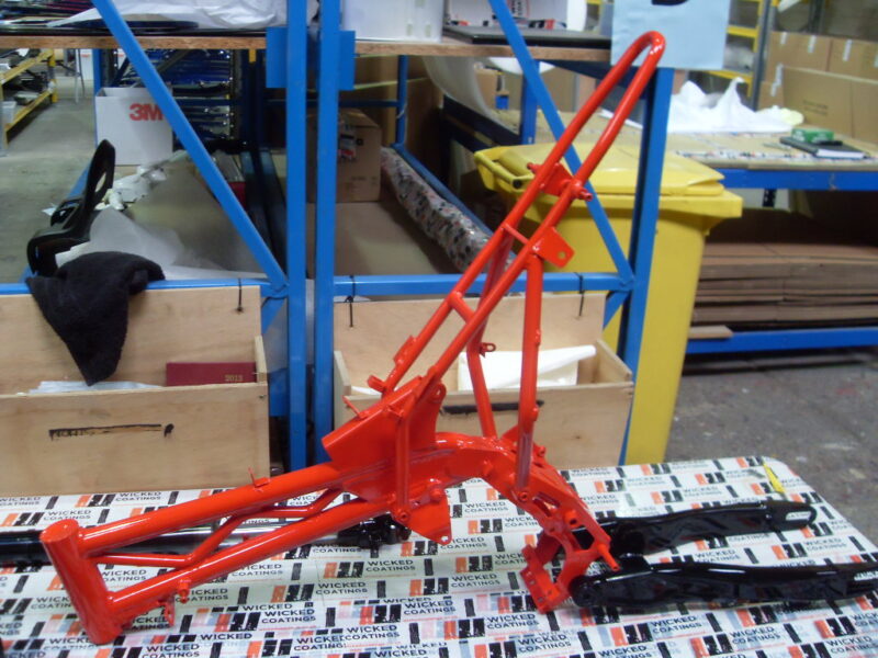 Motorbike frame painted in black and red