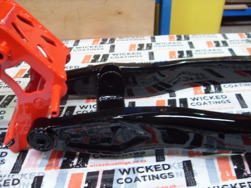 Motorbike frame painted in black and red