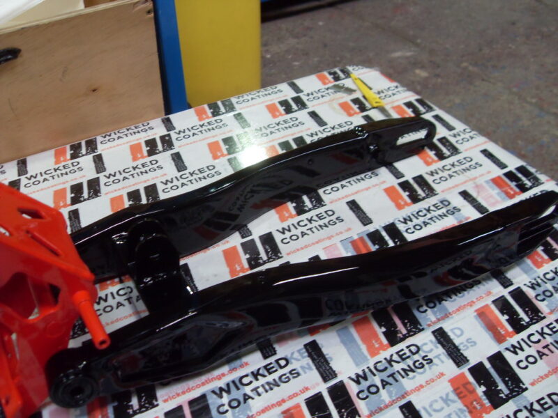 Motorbike frame painted in black and red
