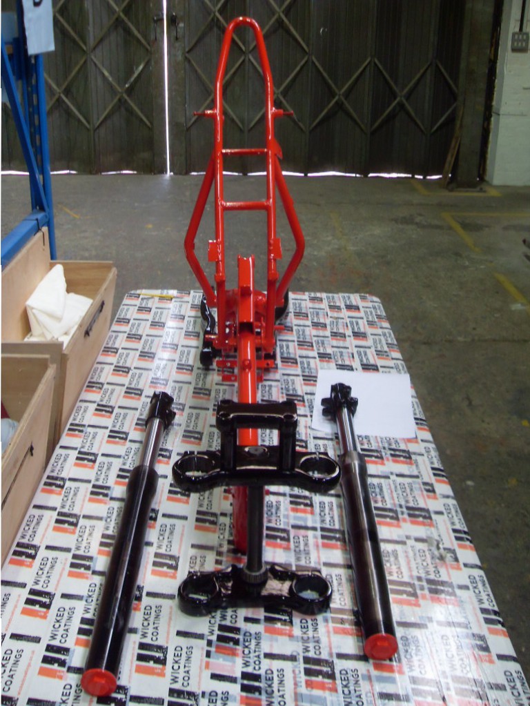 Motorbike frame painted in black and red