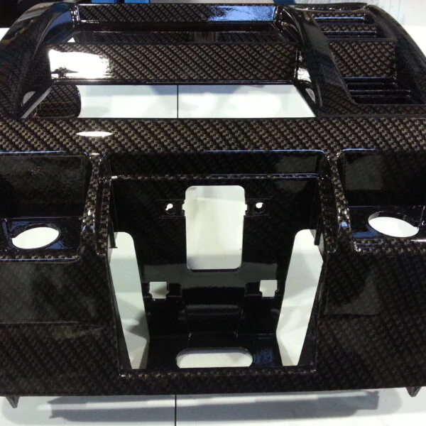 Car dashboard parts coated in carbon fibre hydrographic film painted black