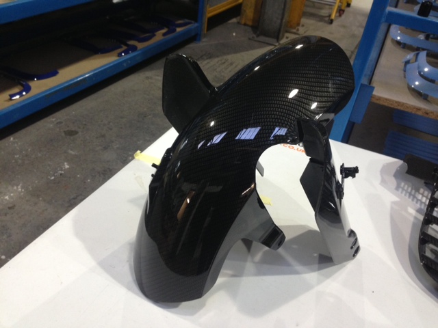 Motorbike element coated in carbon fibre hydrographic film painted black