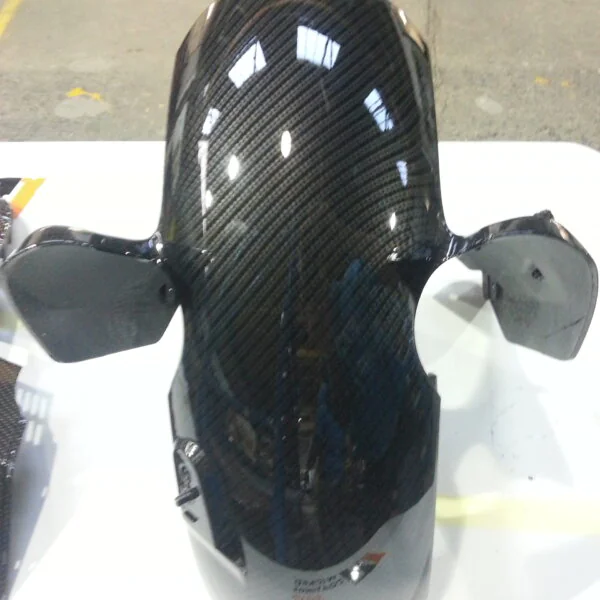 Motorbike element coated in carbon fibre hydrographic film painted black