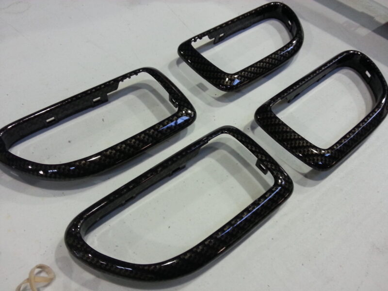 Car interior various elements coated in carbon fibre hydrographic film painted black