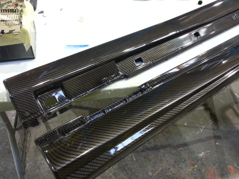 Car interior various elements coated in carbon fibre hydrographic film painted black