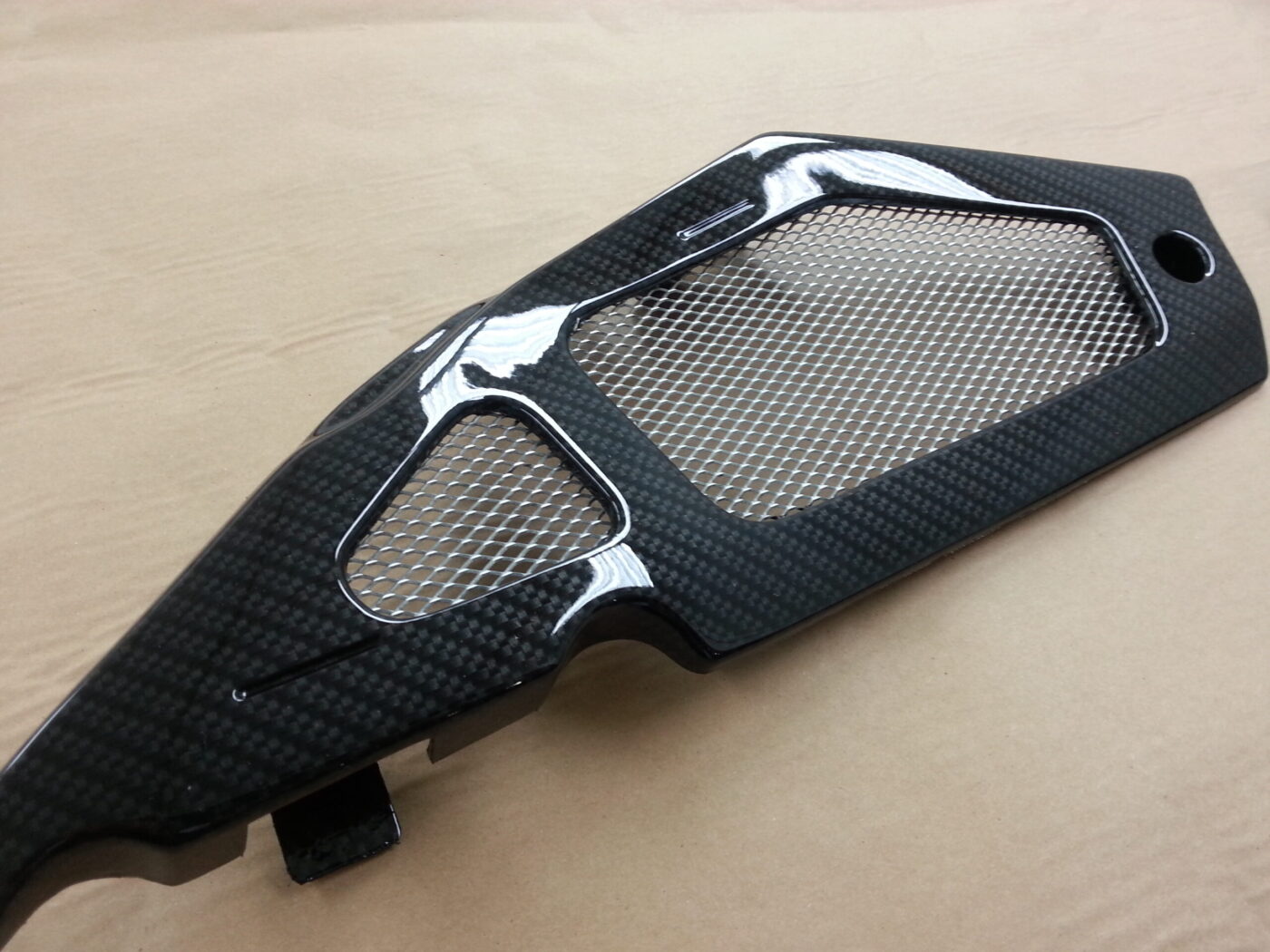 Motorbike elements coated in carbon fibre hydrographic film painted black