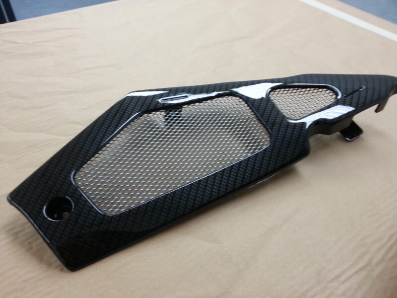 Motorbike elements coated in carbon fibre hydrographic film painted black