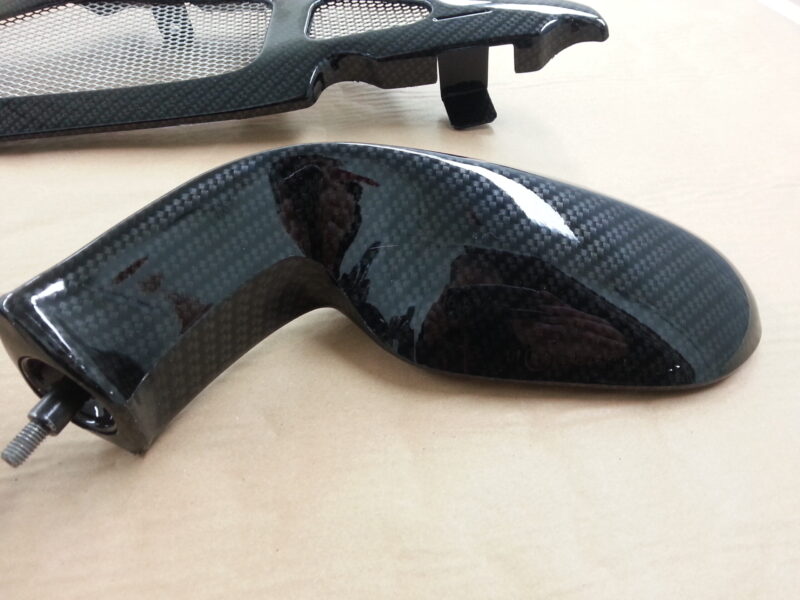Motorbike elements coated in carbon fibre hydrographic film painted black