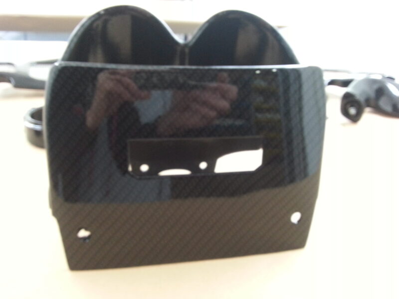 Motorbike elements coated in carbon fibre hydrographic film painted black