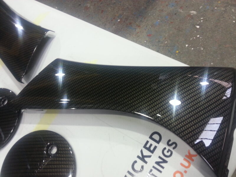 Yamaha motorbike parts coated in carbon fibre hydrographic film